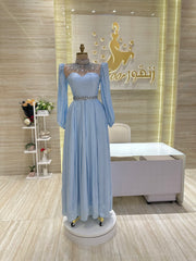 A vintage-inspired double-cloche dress with a flattering silhouette, ideal for a special occasion